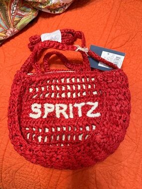 Red 'SPRITZ' Woven Straw Tote Bag with New Full size Makeup inside.